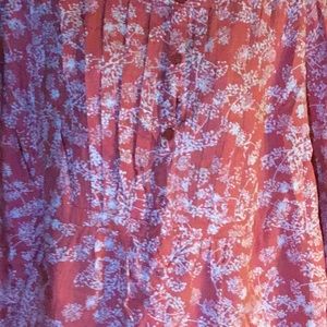 Button down shirt it has pleats in front $back